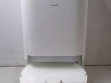 a white machine that is on top of a table