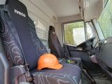a hard hat sitting on the seat of a truck