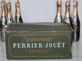 bottles of champagne are lined up in a row on a table