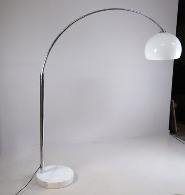 a lamp that is sitting on a table in a room
