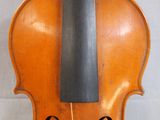 a close up of a violin with a bow on a white background