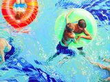 painting of a group of people floating in a pool with inflatable floats