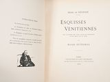 an open book with a picture of a man sitting on a chair