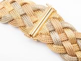an image of a close up of a bracelet on a white surface