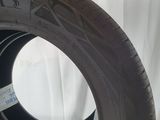 a close up of a tire on a white background