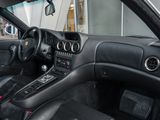 the interior of a black sports car is clean and ready to be driven