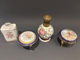 three different types of vases and a box on a table