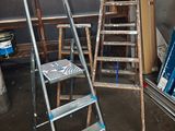 a ladder that is leaning against a wall in a room