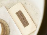 a close up view of a white bowl with a label on it