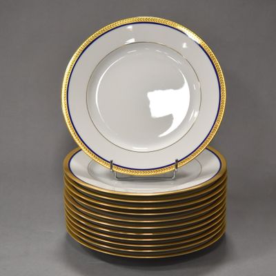 six plates stacked on top of each other on a table
