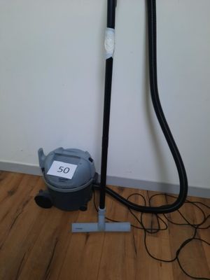 an image of a vacuum and a dryer on the floor
