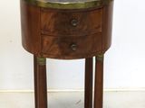 a small table with a marble top on it