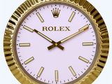 une montre en or avec un cadran blanc et une couronne sur le cadran