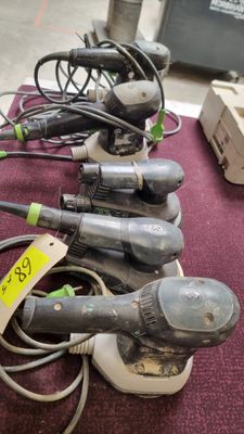 many different types of corded vacuums on a table
