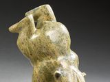 an image of a sculpture of a bear on a gray background