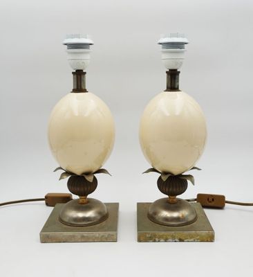 pair of art deco table lamps in the manner of person