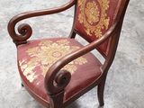 an old chair with red upholstered upholstered upholstered upholstered upholstered upholstered upholstered upholstered upholstered