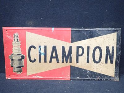 une affiche sur laquelle est inscrit « champion » sur fond noir