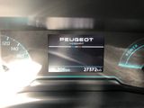 the dashboard of a car with a digital display on it