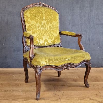 an image of a chair with a yellow upholstered upholstered upholstered upholstered back