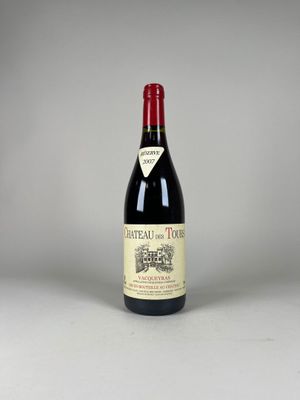 a bottle of wine that is sitting on a table
