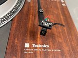a turntable with a record player attached to it