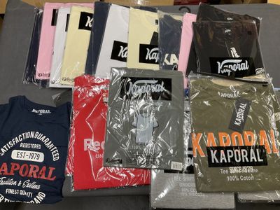 many t - shirts that are on a table together