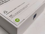 an apple box with a sticker on it sitting on a table