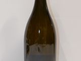 a bottle of wine that is sitting on a table