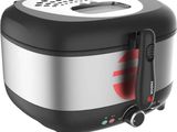 a close up of a black and silver toaster on a white background