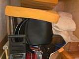 a small room with a lot of clutter in it