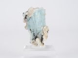 a small piece of rock that is sitting on a stand