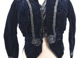 an image of a blue velvet jacket on a mannequin