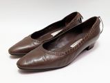 chaussures vintage en cuir marron avec un motif croco sur le talon
