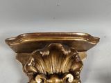 pair of antique brass wall sconces with a lion head