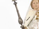 an image of a statue of a woman wearing a crown and holding a sword
