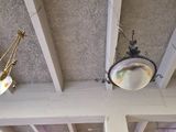 two lamps hanging from the ceiling of a room