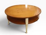 an image of a round coffee table with a wooden top