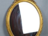 a mirror that is sitting on a table