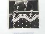an old black and white photo of a man in a suit and tie