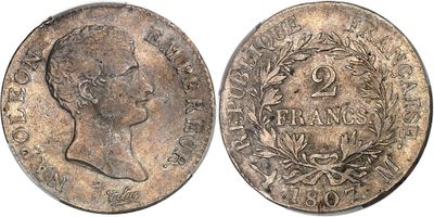 a close up of a coin on a white background