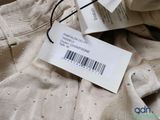 a label on a dress that says, ' honey ' s champagnetone '