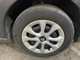 a close up of a tire on a car ' s rim