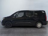 a picture of a black van parked in a garage