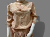 an image of a mannequin wearing a pink dress and hat