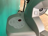 an image of a hair dryer sitting on a chair