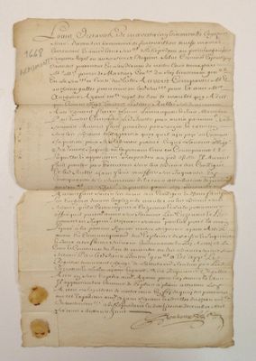 a piece of paper with writing on it sitting on top of a table