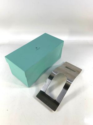 a close up of a watch in a box on a table