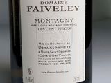 a bottle of wine sitting on a table with a label on it