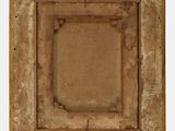 an old wooden frame with a square hole in the middle